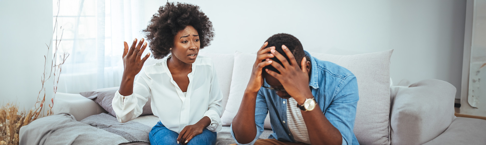 Couple arguing at home during a domestic dispute