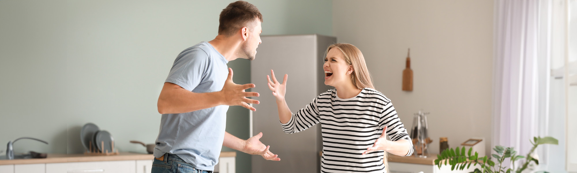 angry couple having arguments at home