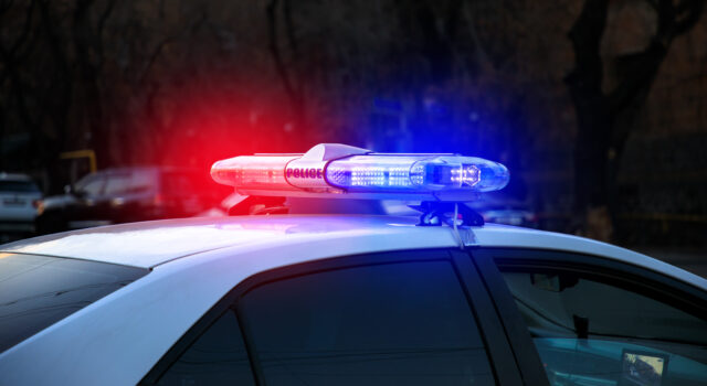police car in the night light street
